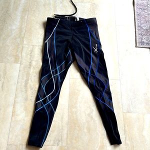 CW-X running tights. For endurance and stability. Medium